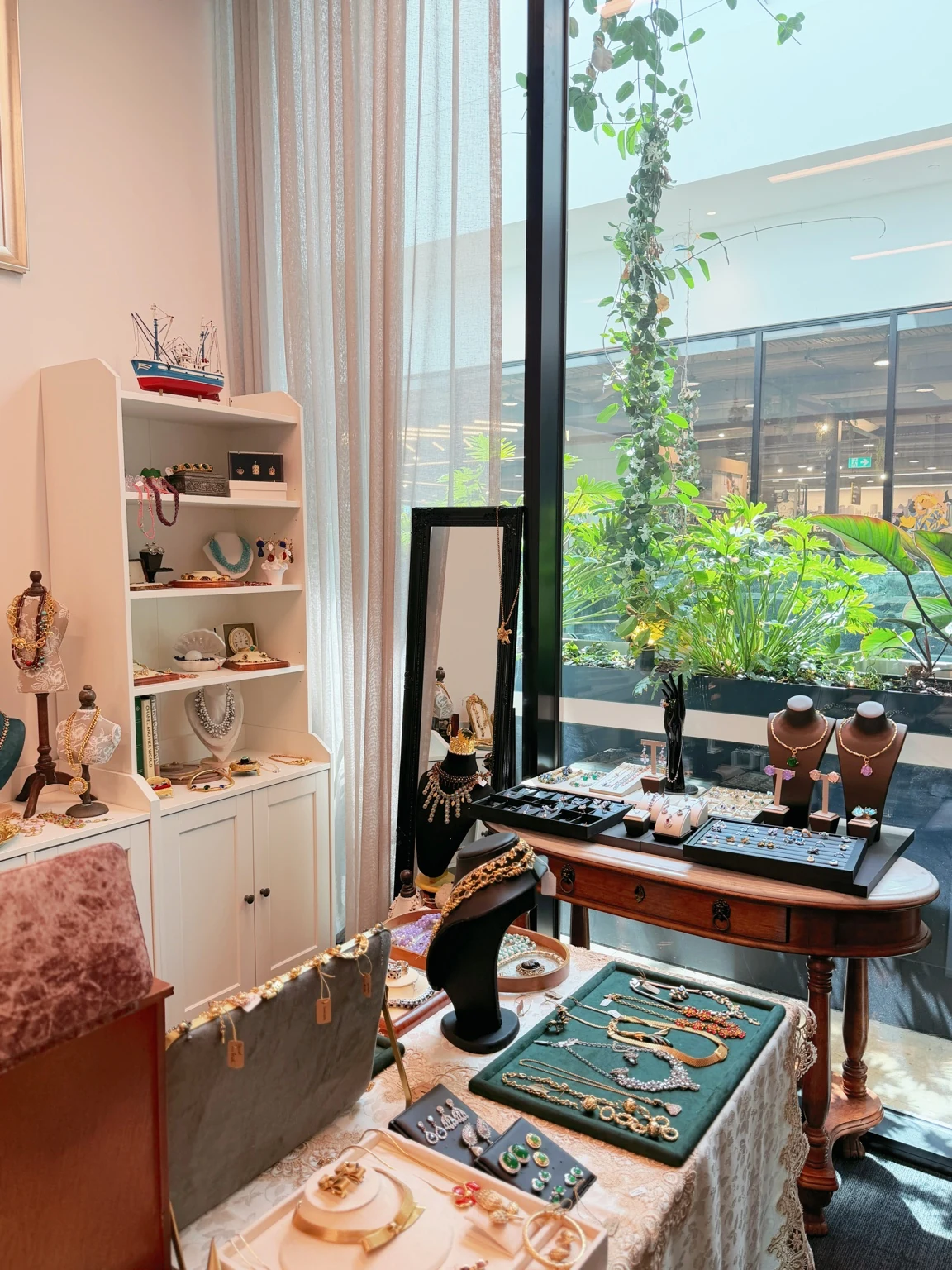 Serendipity Vintage boutique jewellery display with curated vintage necklaces, earrings and brooches